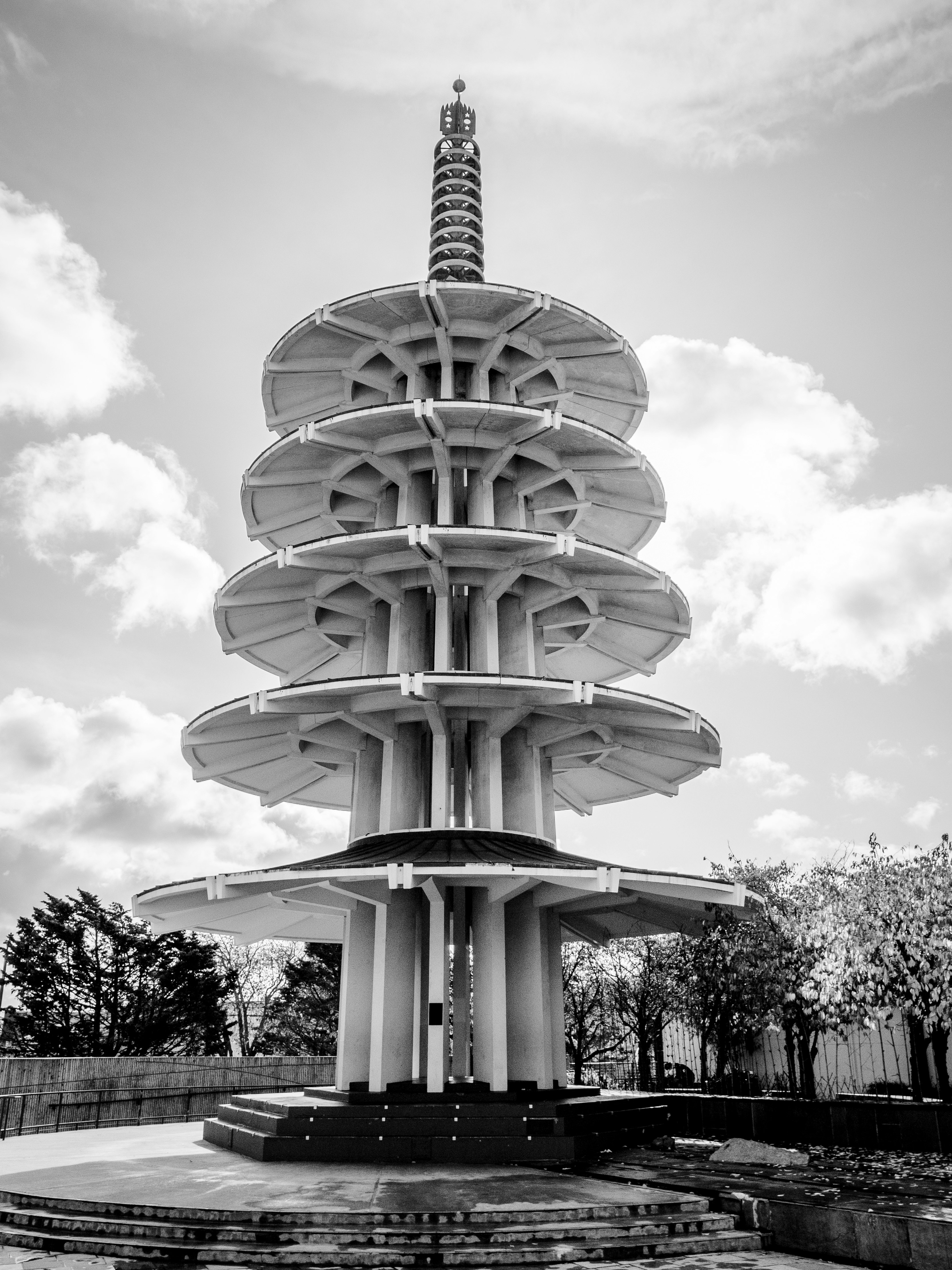 white concrete building under cloudy sky during daytime